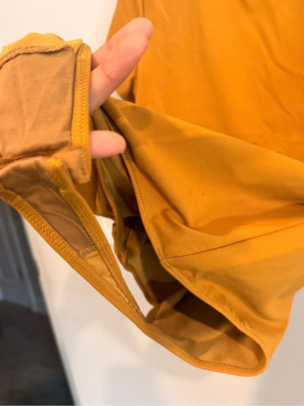 Free People Alexis Tee Bodysuit in a mustard